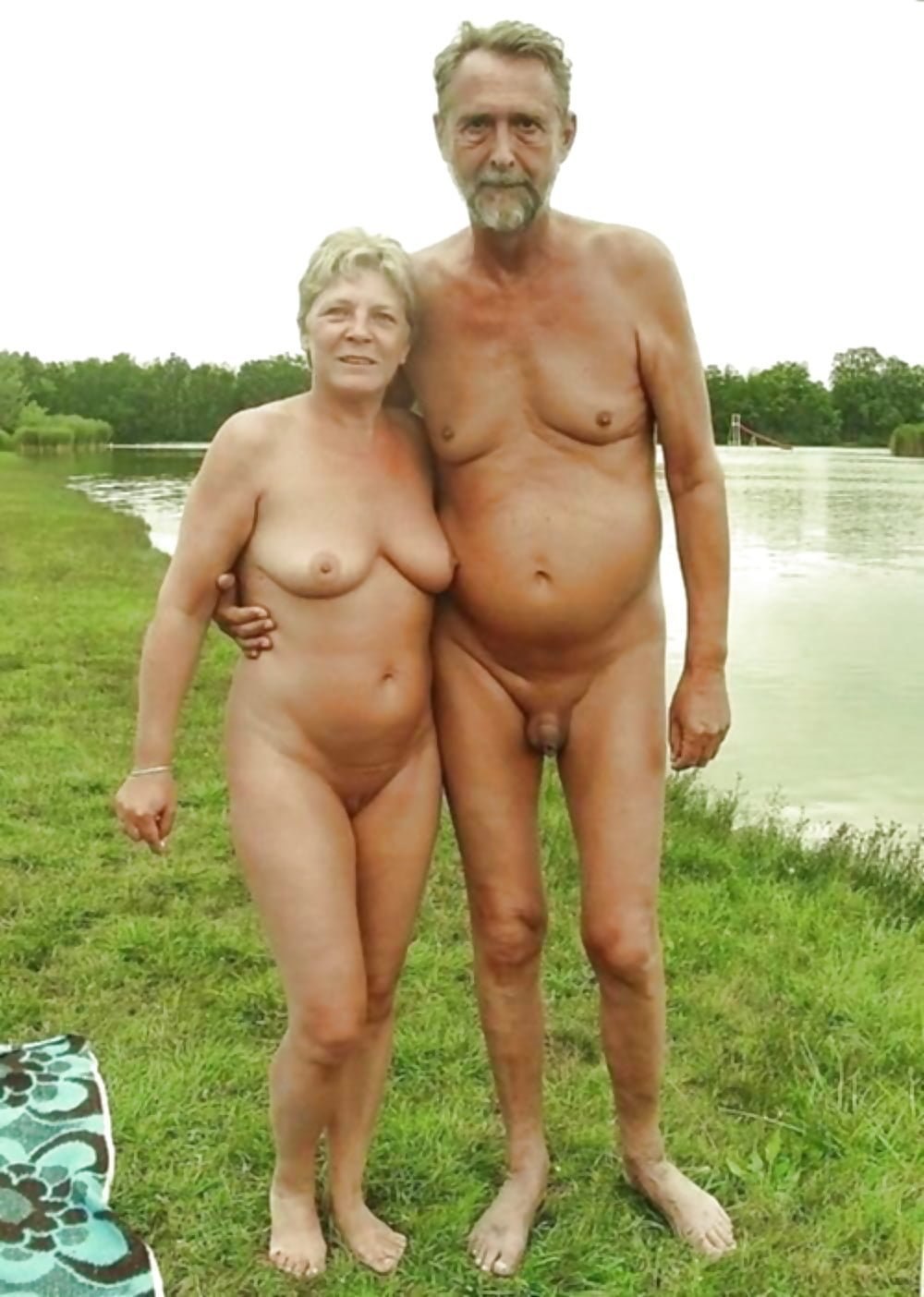Naked men and women on the beach