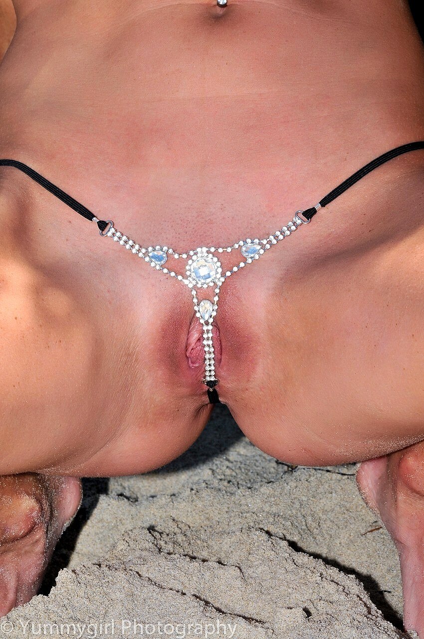 Huge clits in micro bikini