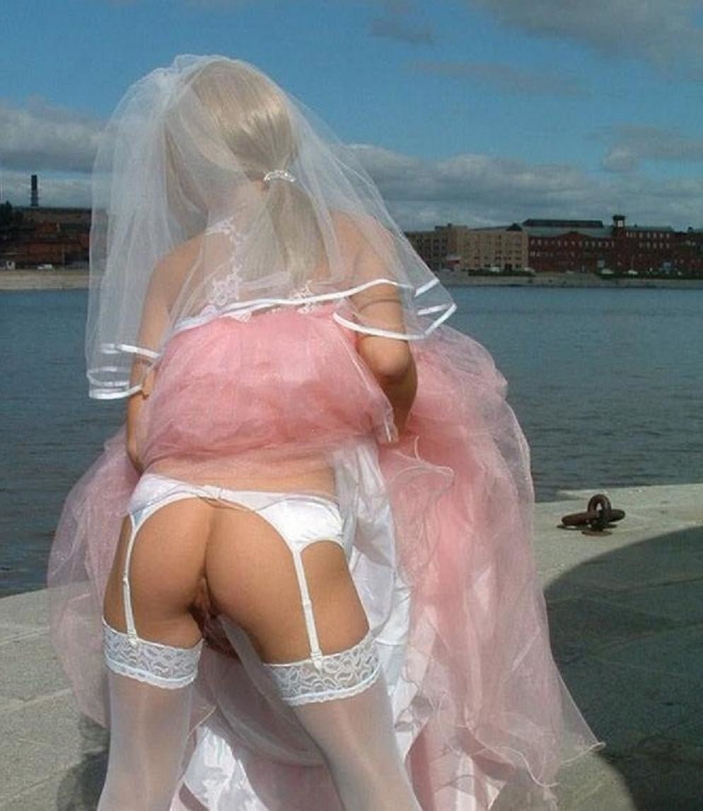 Brides in wedding dresses without panties