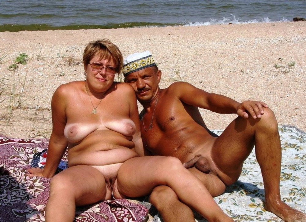 Naked elderly men on the beach