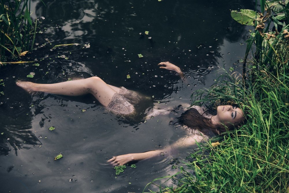 Girl in the Sinking in Quicksand swamp