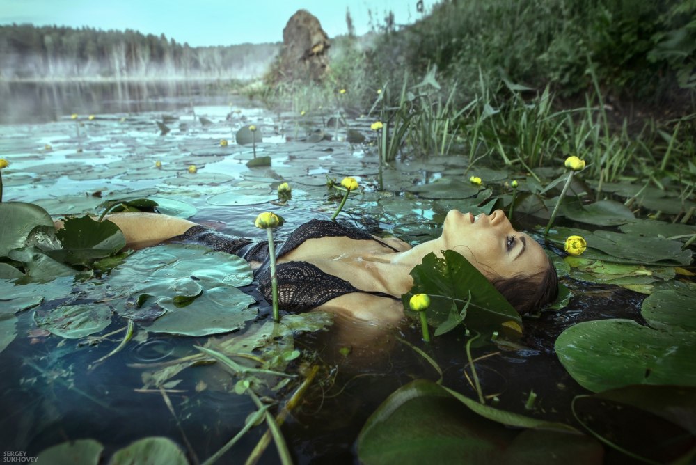 Girl naked in a swamp