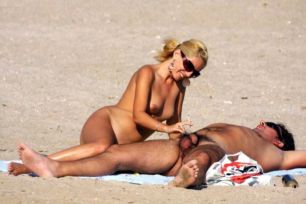 Swingers on a nudist beach