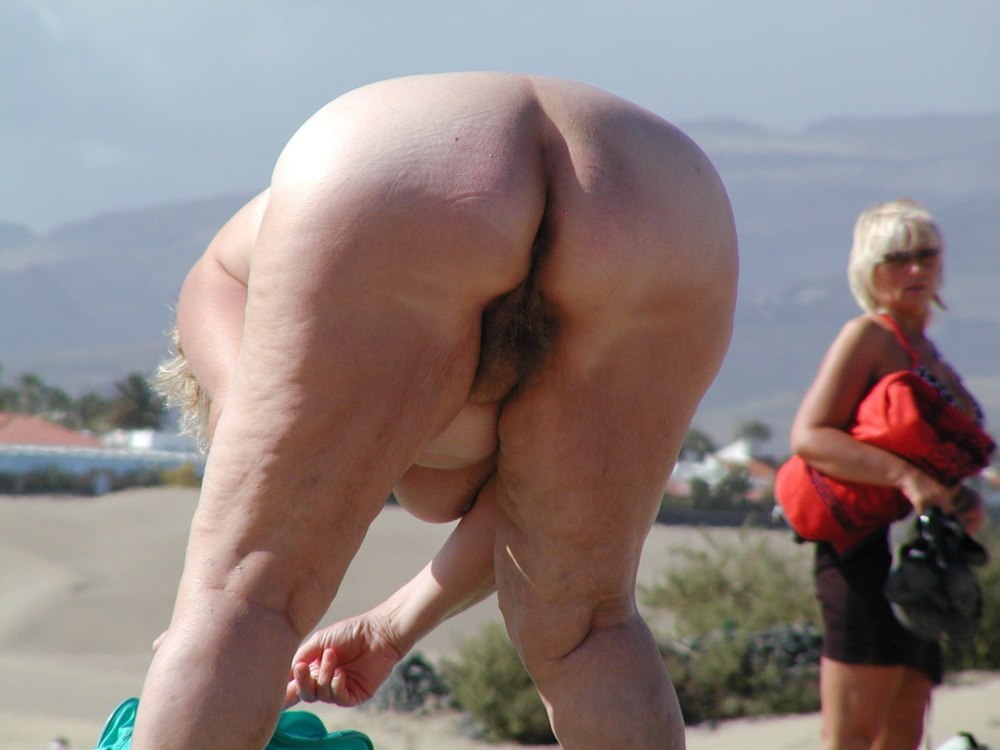 Naked ass old woman at sea