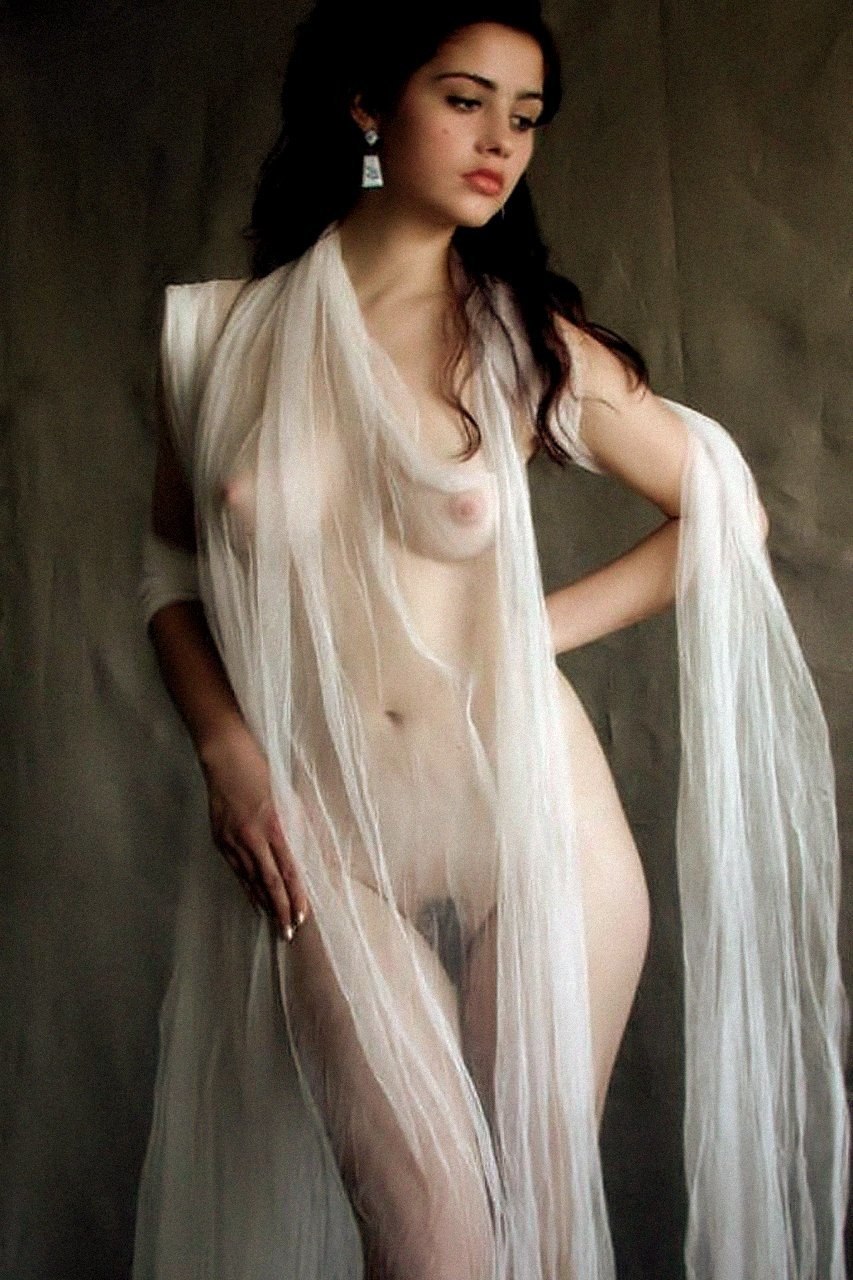 Naked girls in a dress in a net