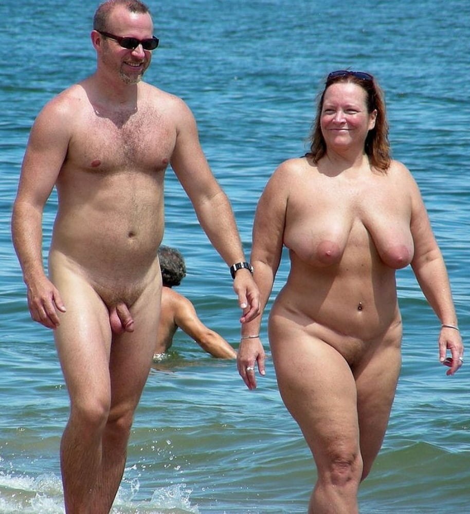 Naked family with big tits on the beach